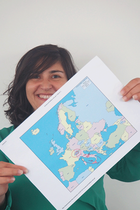 Woman showing the map of the European continent