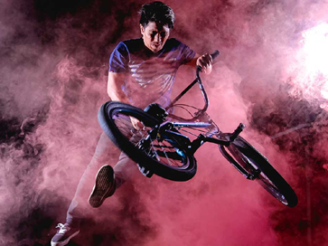 BMX cyclist represents the digital transformation more securely, swiftly, and agilely